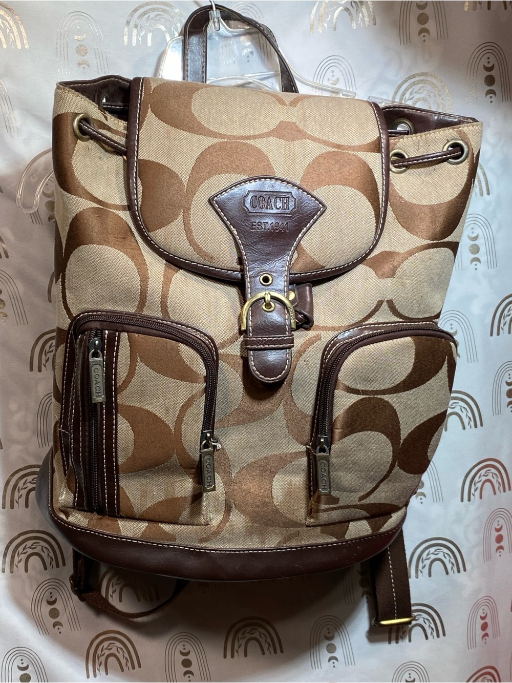 C Brown and Tan Signature Canvas Backpack